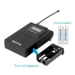 BY-WM8 PRO wireless microphone receiver with battery compartment (requires 2 AA batteries) for professional audio recording setups.